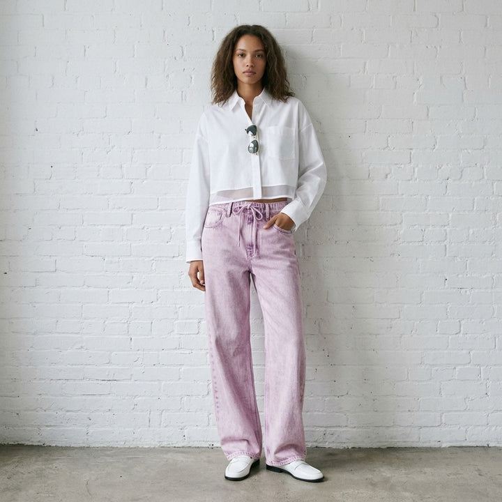 rag & bone Miramar Wide Pull-On Jeans in light indigo wash, featuring a relaxed wide-leg silhouette, pull-on waistband, and five-pocket construction with vintage sun-bleached fading - lifestyle