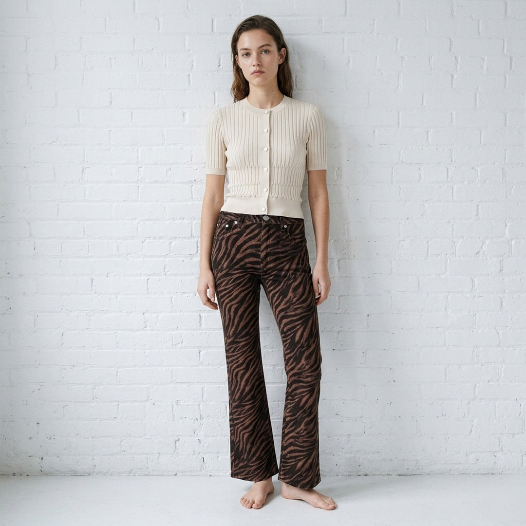 rag & bone Miramar ankle pants in brown and black zebra print ponte fabric with a flared hem and silver-tone hardware, front view - lifestyle