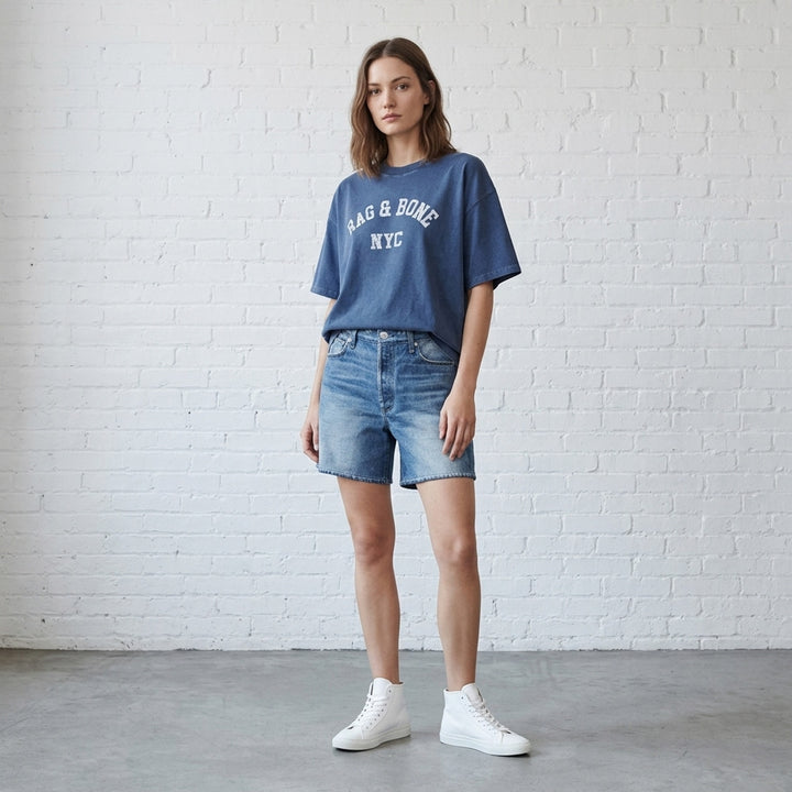 rag & bone University Alex Tee in washed navy, featuring a distressed arched collegiate graphic print reading 'RAG & BONE NYC', relaxed oversized fit with a crewneck collar and short sleeves - lifestyle