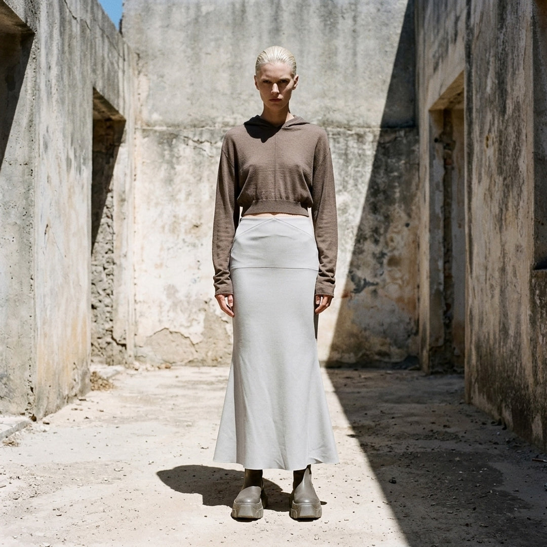 Rick Owens Strutter midi skirt in off-white cady with angled yoke seaming and a flared hem - lifestyle