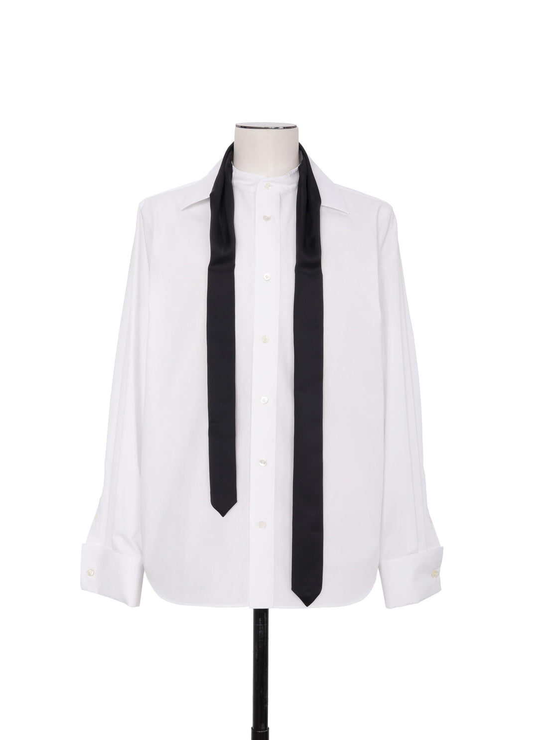 sacai white poplin long sleeve shirt with spread point collar and attached black satin tie panels draped from the neckline, mother-of-pearl button placket, shown on a mannequin against a white background