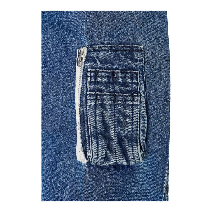 sacai x Levi's denim blouson jacket in stonewashed indigo with white zip front, flap chest pockets and sleeve zip pocket - packshot