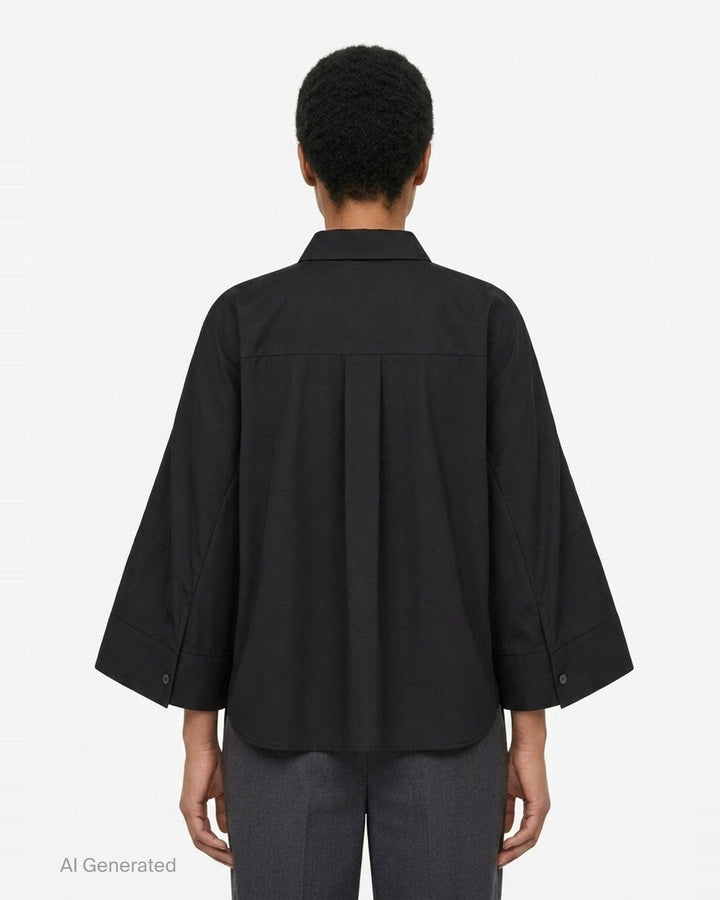 sacai Wide Sleeve Poplin Shirt in black, featuring a concealed button placket, point collar, flared long sleeves with deep cuffs, a chest patch pocket, and twin lower patch pockets - back