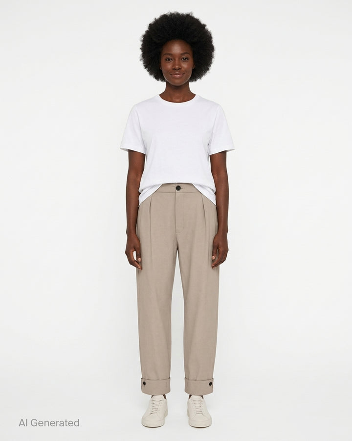 Setchu Origami Pants 2 in a stone-toned wool-cotton blend, shown front view with pleated waist, button fly and button-tab cuffs - front