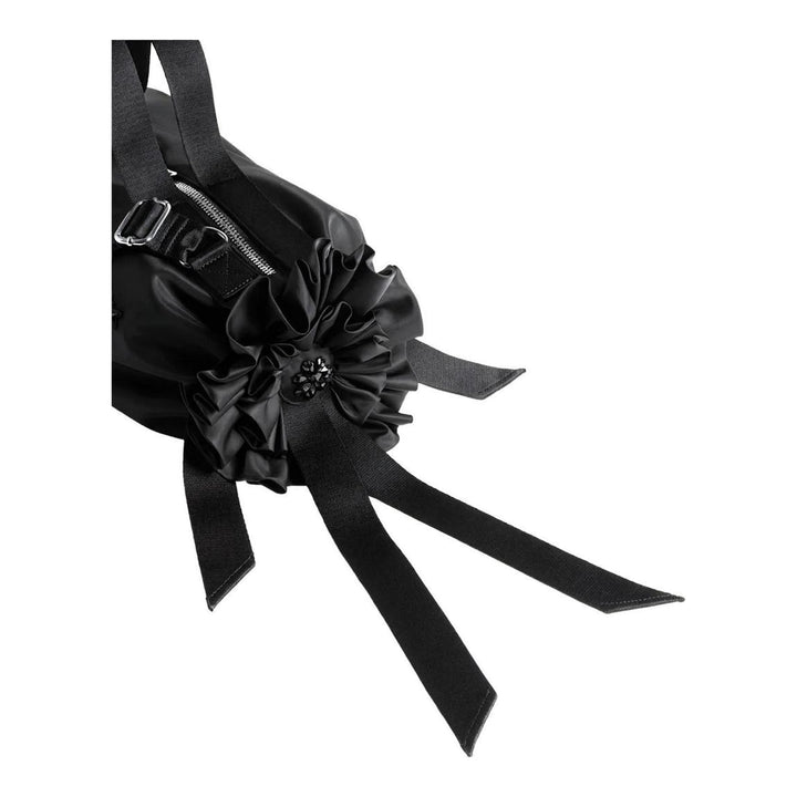 Simone Rocha Double Ribbon Rosette Bag in black satin with beaded floral embellishment, ruffled rosette ends and ribbon tassels - packshot