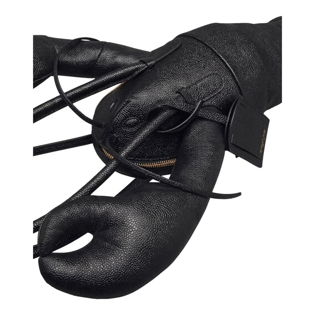 Thom Browne black pebble-grain leather lobster-shaped tote bag with raised claws, rolled handles and a luggage tag - packshot