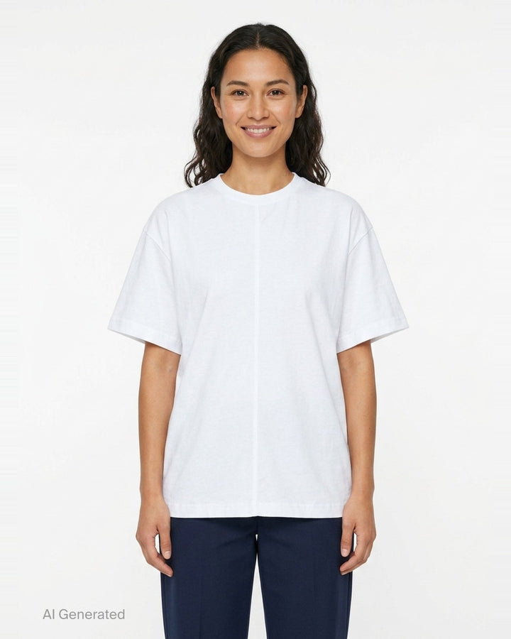 Totême Slouch Waist Jersey Top in white, featuring an oversized dropped-shoulder silhouette, centre-front seam, crew neckline, and short sleeves with folded cuffs, photographed flat on a white background - front