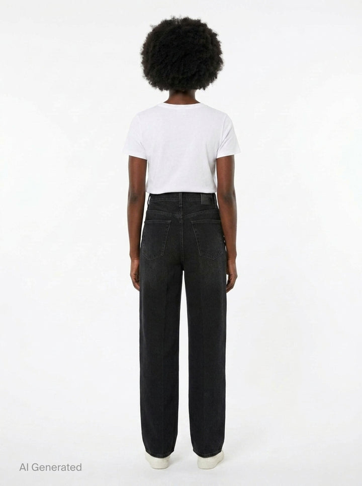 Totême Wide Leg Jeans in washed black denim, featuring a high-rise waist, five-pocket construction, and a relaxed straight-falling leg, shown flat against a white background - back