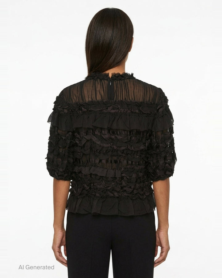 Ulla Johnson Mabel Short Sleeve Silk Top in black — sheer silk with cascading tiered ruffles, frayed collar trim, and puffed short sleeves - back