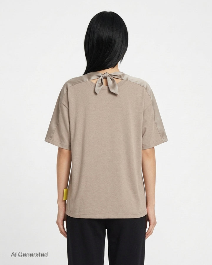 Undercover Shoulder Panel Tee in taupe with satin shoulder panels, chest pocket and knotted ribbon tie at the back neckline - back