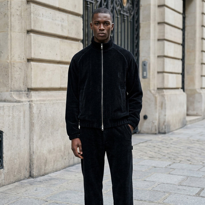 Wooyoungmi Flock Track Jacket in beige wide-wale corduroy with full-length silver zip, mock neck collar, raglan sleeves, and tonal logo patch - lifestyle